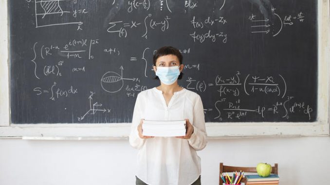 Coronavirus pandemic - Back to school concept.