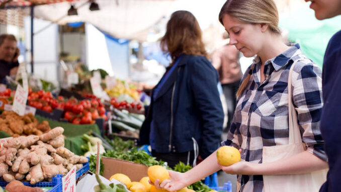 young woman shopping at the market