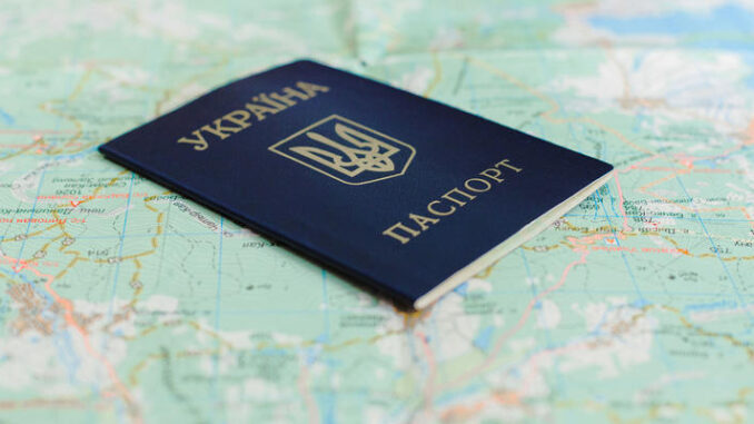 Ukrainian passport on tourist map