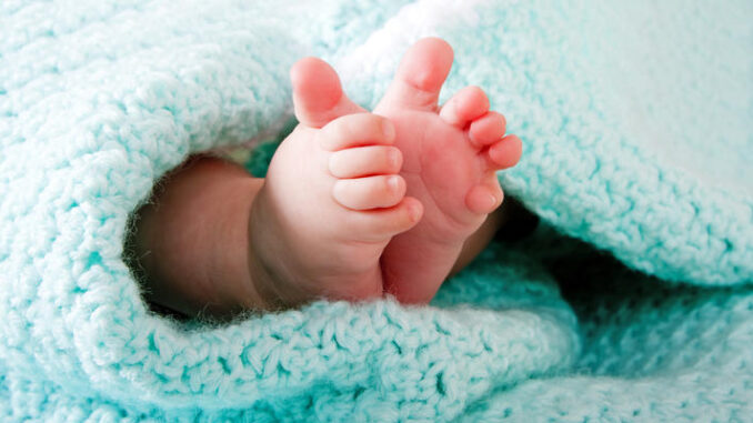 Baby feet in blanket