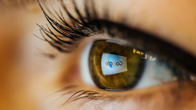 Google logo reflected on eye