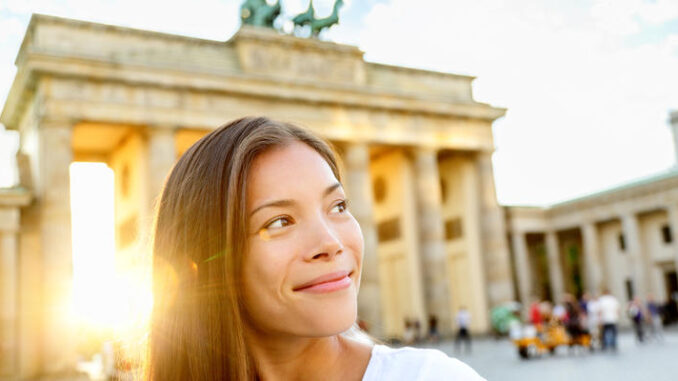 Berlin people - woman at Brandenburg Gate