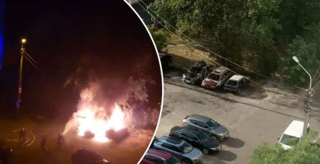 Дівчина в білій футболці била машину ногою: вночі невідомі спалили три авто на Оболоні у Києві