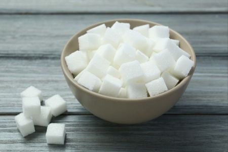 У Китаї навчилися створювати цукор із вуглекислого газу: як працює технологія